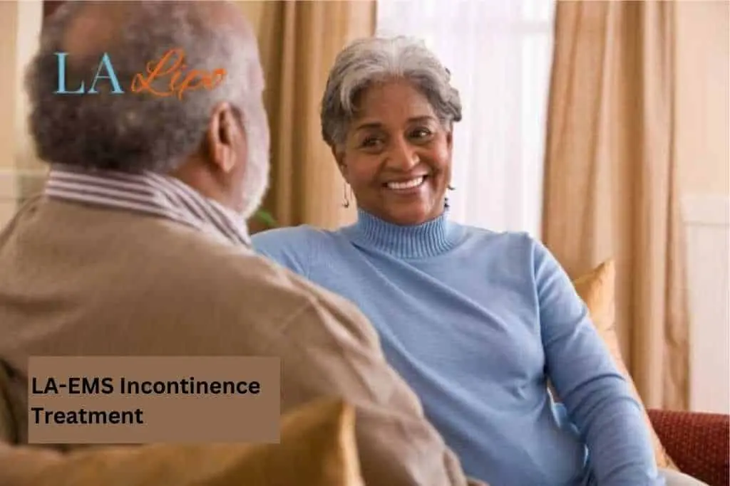 Couple sat smiling at each other - LA-EMS treatment Wakefield